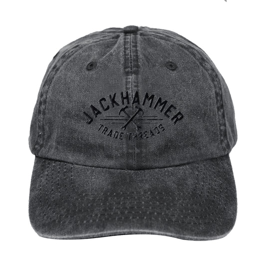 Black denim cap with 'Jackhammer Trade Threads' logo on a white background